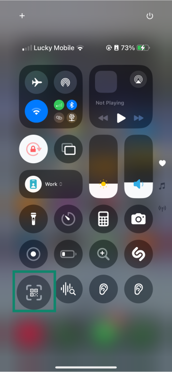 An iPhone screenshot, showing the QR code scanner button in the Control Center.