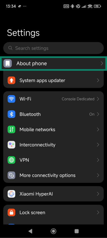 Android settings interface showing how to access the About phone menu.